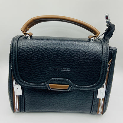 This handbag is a structured, genuine leather tote-style bag designed for modern women who value both elegance and functionality.