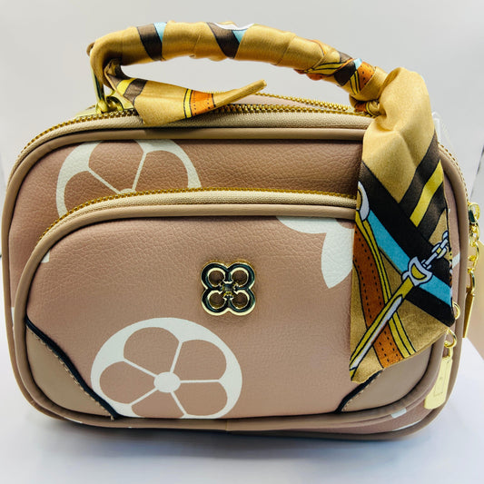 This handbag is a structured, genuine leather tote-style bag designed for modern women who value both elegance and functionality.