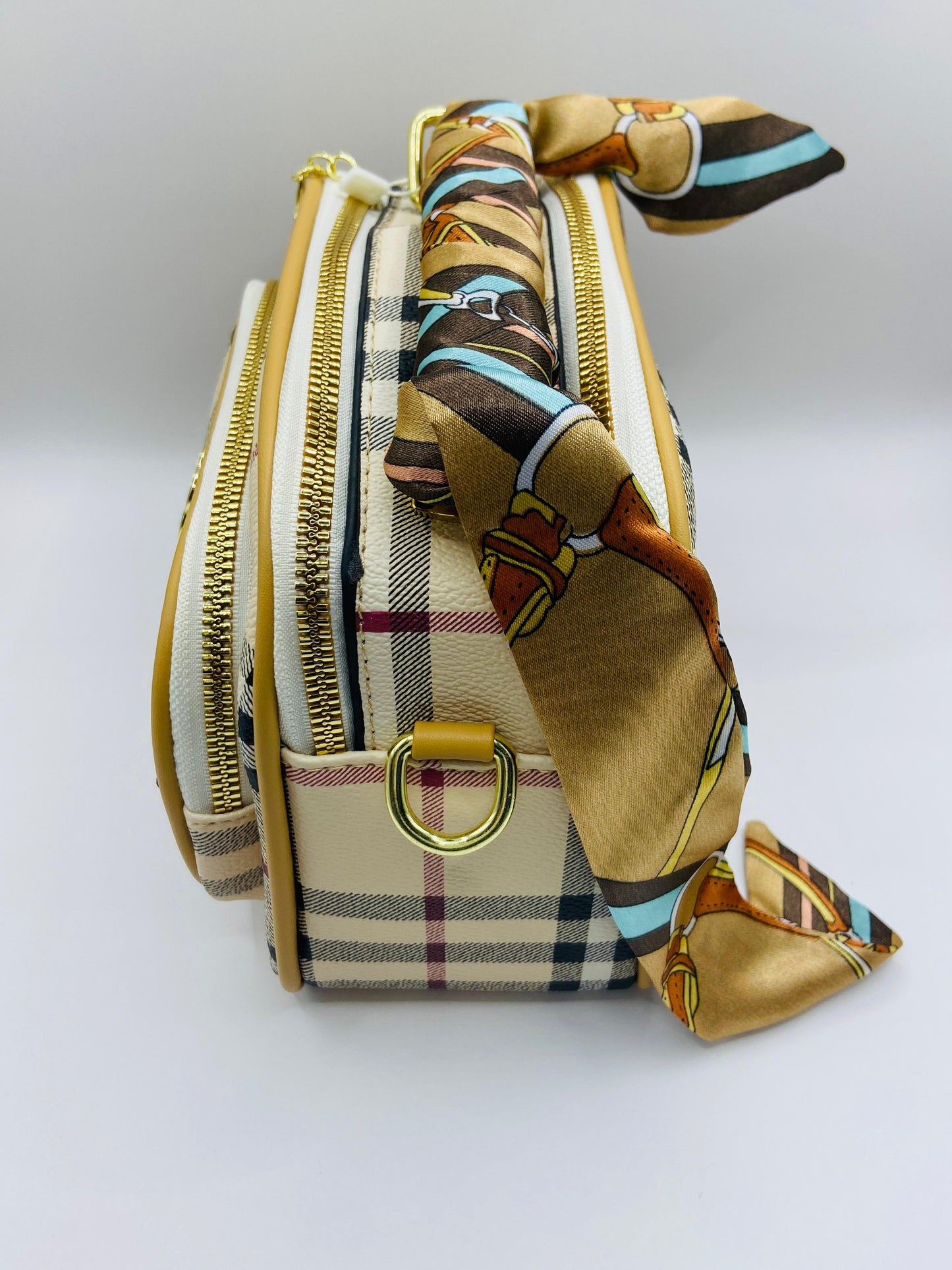 This handbag is a structured, genuine leather tote-style bag designed for modern women who value both elegance and functionality.