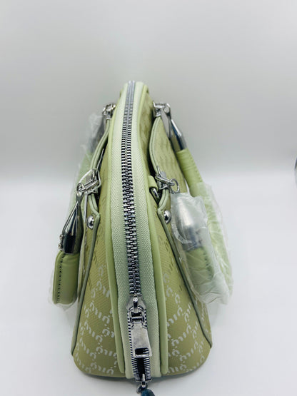 This handbag is a structured, genuine leather tote-style bag designed for modern women who value both elegance and functionality.
