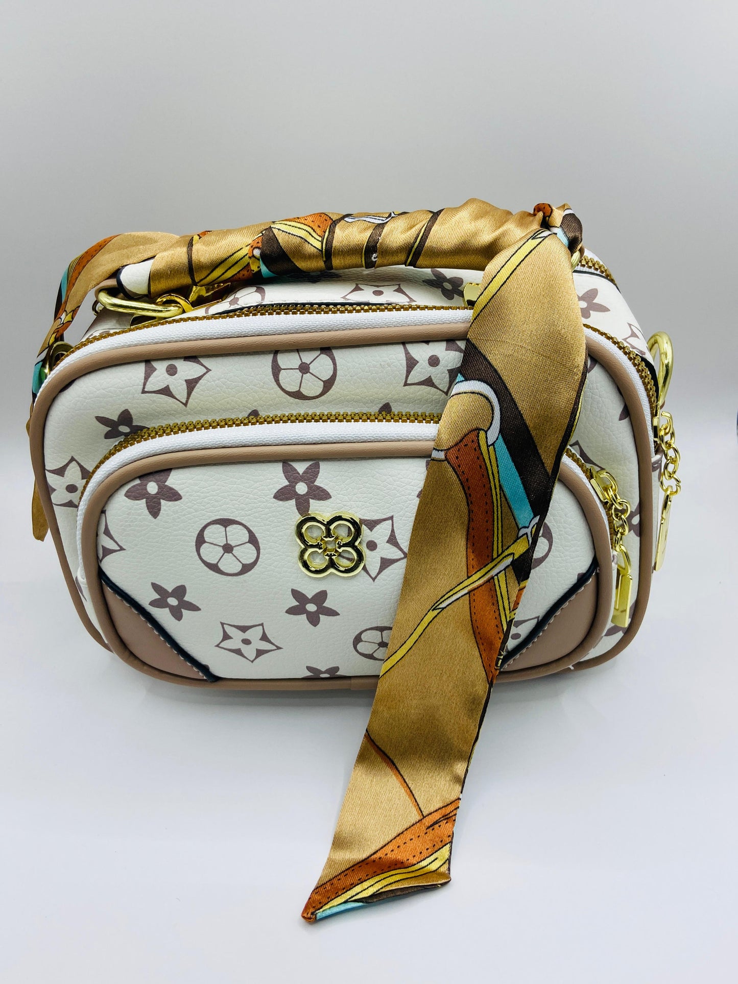 This handbag is a structured, genuine leather tote-style bag designed for modern women who value both elegance and functionality.