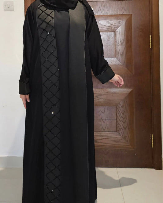 "Luxury in Every Detail – Timeless Black Abaya with Beaded Elegance"