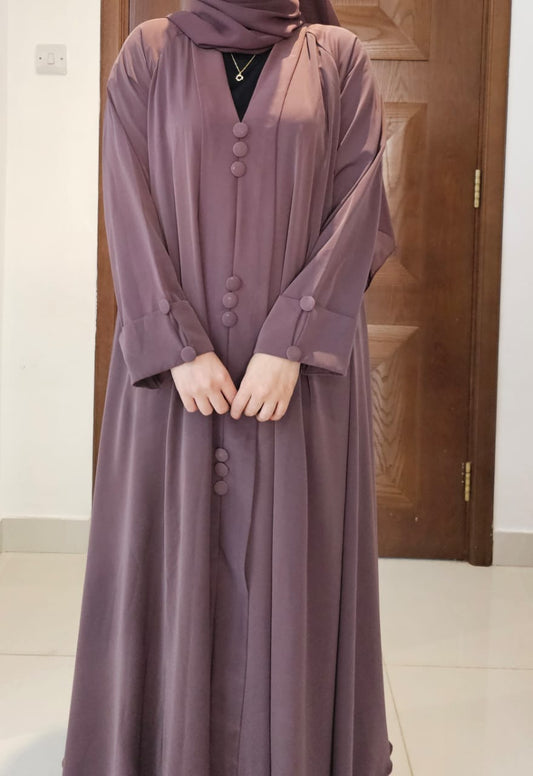 "Effortless Modesty – Chic Mauve Abaya with Elegant Button Detailing"