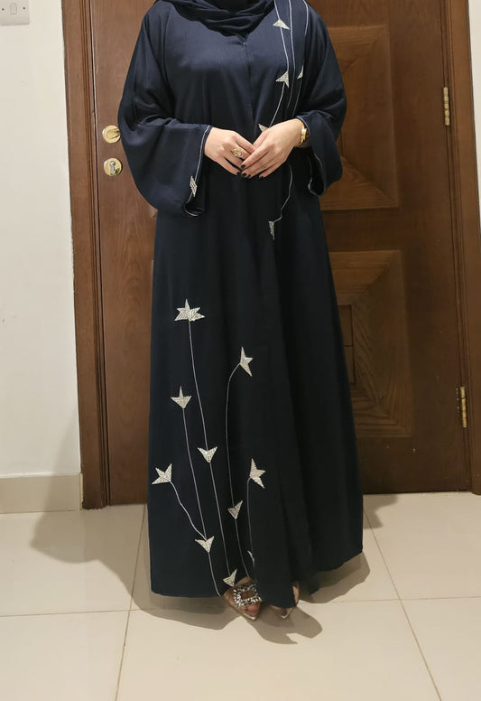"Shine with Grace – Navy Abaya Embellished with Silver Star Accents"