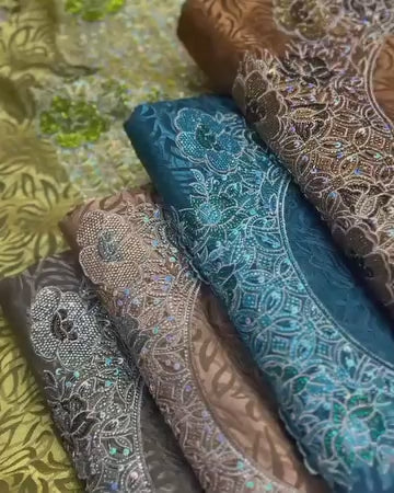 This new silk fabric features 3D jacquard embroidery, embroidered No. 6 stones, and new beads, adding a luxurious and unique touch.
