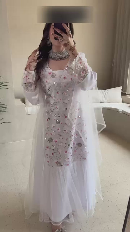 This Jadam dress is crafted from high-quality tur fabric and lined with soft Armani silk,