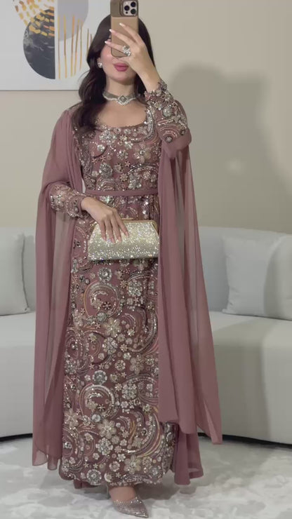 This luxurious dress is crafted from soft chiffon with an Armani silk
