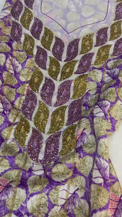 This luxurious Indonesian silk is presented in a new design, adorned with delicately set stones and six beads