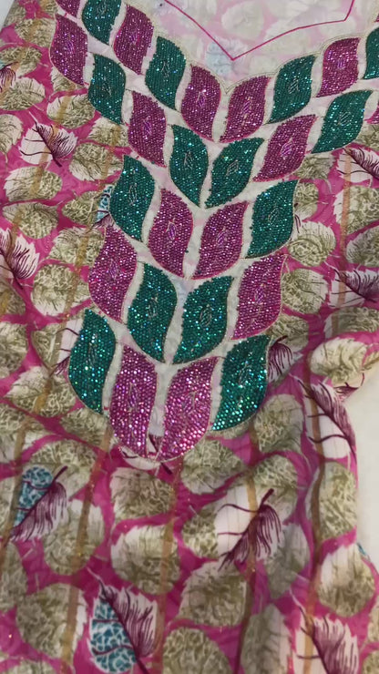This luxurious Indonesian silk is presented in a new design, adorned with delicately set stones and six beads