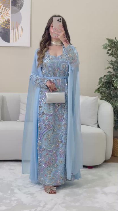 This luxurious dress is crafted from soft chiffon with an Armani silk