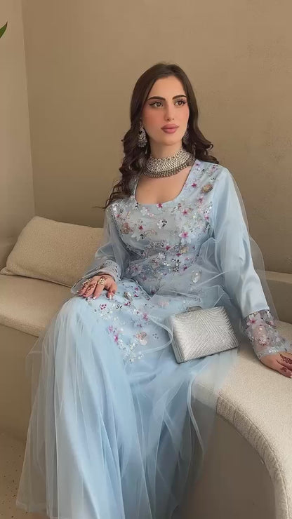 This Jadam dress is crafted from high-quality tur fabric and lined with soft Armani silk,