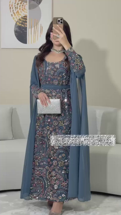 This luxurious dress is crafted from soft chiffon with an Armani silk