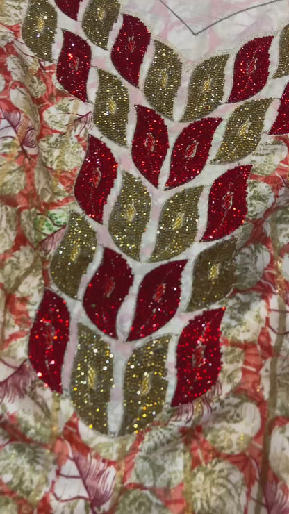 This luxurious Indonesian silk is presented in a new design, adorned with delicately set stones and six beads