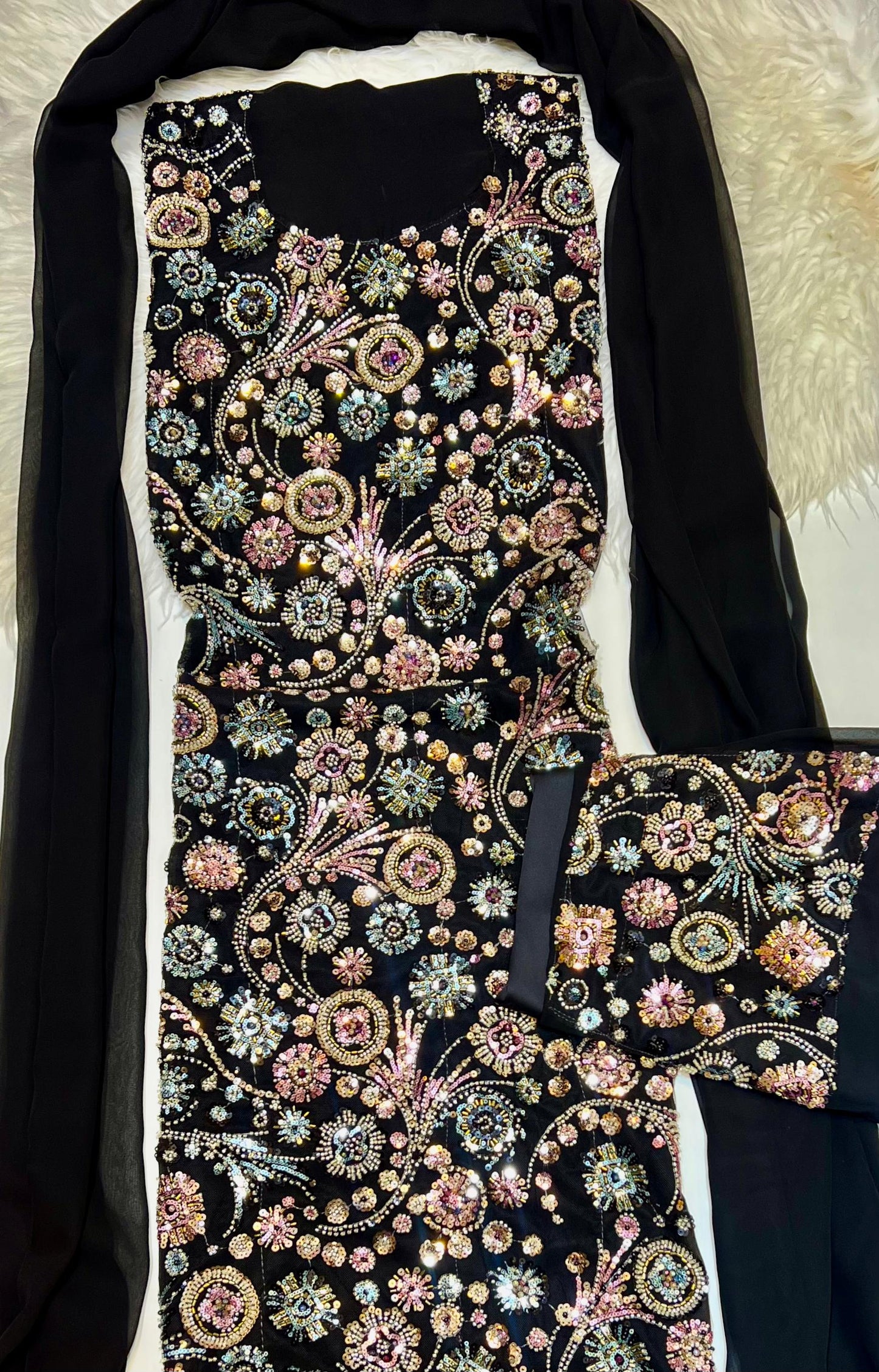 This luxurious dress is crafted from soft chiffon with an Armani silk