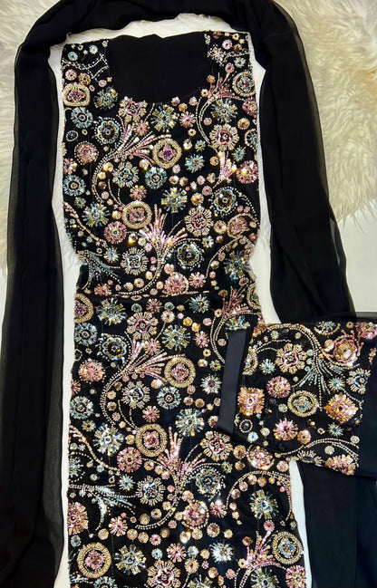 This luxurious dress is crafted from soft chiffon with an Armani silk