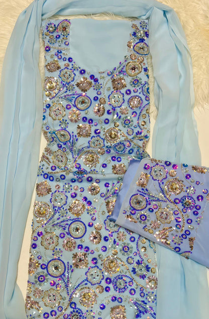 This luxurious dress is crafted from soft chiffon with an Armani silk