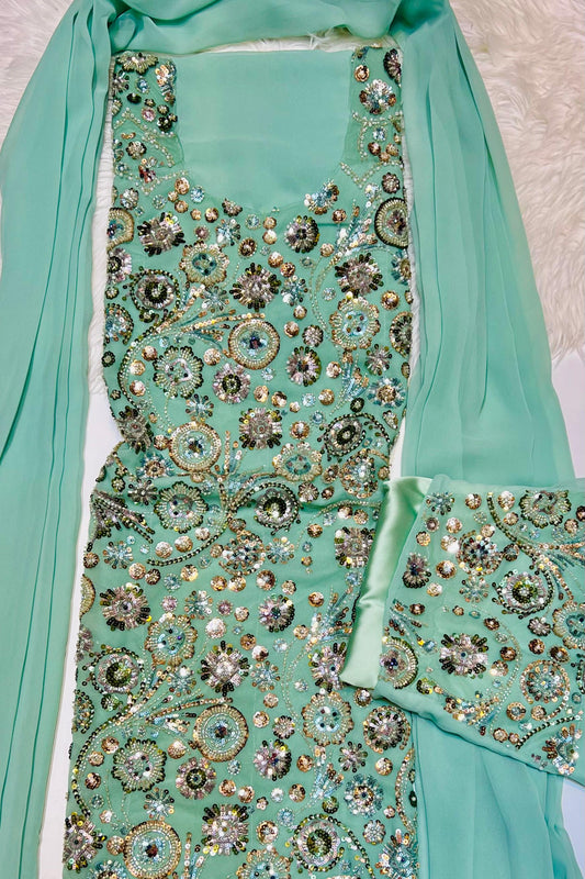 This luxurious dress is crafted from soft chiffon with an Armani silk
